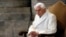 FILE: FILE - In this Tuesday, Dec. 8, 2015. filer, Pope Emeritus Benedict XVI attends a Mass prior to the opening of the Holy Door of St. Peter's Basilica.. 