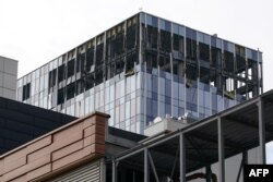 A view of a damaged business centre on Likhacheva Street after a reported drone attack in Moscow on July 24, 2023. (Photo by STRINGER / AFP)