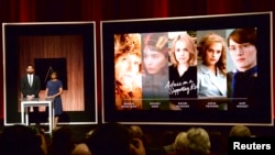 Actor John Krasinski (L) and Academy of Motion Picture Arts and Sciences President Cheryl Boone Isaacs announce the nominees for the Best Actress in a Supporting Role during the nominations announcements for the 88th Academy Awards in Beverly Hills, Calif