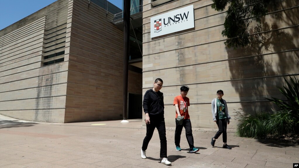 FILE - Students walk around the University of New South Wales campus in Sydney, Australia, Tuesday, Dec. 1, 2020. Australia’s government has invited backpackers and students to seek work in the country. (AP Photo/Mark Baker)