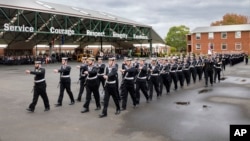 FILE - Royal Australian Navy recruits march during their graduation ceremony on April 26, 2024, in Melbourne. Military officials said on July 18, 2024, that they are on track in creating a new antimissile air defense system. (Australian Defense Force via AP)