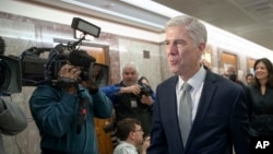 Supreme Court nominee Neil Gorsuch arrives for a meeting with Sen. Susan Collins, R-Maine, on Capitol Hill in Washington, Feb. 9, 2017. Gorsuch has said he found President Donald Trump's attacks on the judiciary "disheartening" and "demoralizing." 