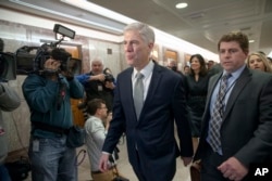Supreme Court nominee Neil Gorsuch arrives for a meeting with Sen. Susan Collins, R-Maine, on Capitol Hill in Washington, Feb. 9, 2017. Gorsuch has said he found President Donald Trump's attacks on the judiciary "disheartening" and "demoralizing."
