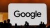 FILE - Audience members gather at Made By Google for new product announcements at Google, Aug. 13, 2024, in Mountain View, Calif. 