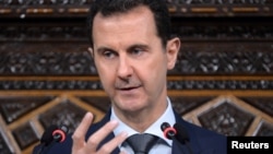FILE - Syrian President Bashar al-Assad