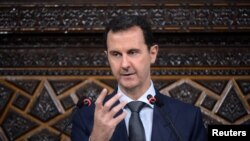 Suriya Prezidenti Bashar Assad parlamentda nutq so'zlamoqda. Damashq, 7-iyun, 2016-yil.