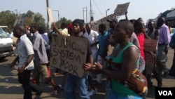 Suspected MDC youths demonstrating in Harare demanding an election re-run