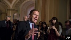 FILE - Sen. Richard Blumenthal, D-Conn., talks to reporters on Capitol Hill in Washington, May 16, 2017. He has co-sponsored legislation introduced Oct. 11, 2022, to halt arms sales to Saudi Arabia for one year in response to a planned oil production target cut by OPEC+.
