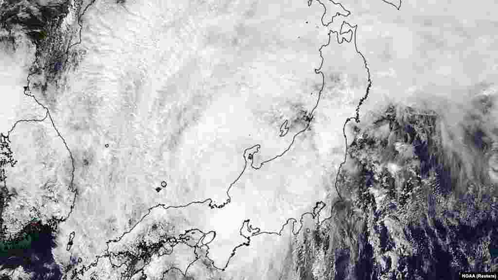 A Moderate Resolution Imaging Spectroradiometer (MODIS) image from NASA's Aqua satellite shows Typhoon Halong on Japan's main islands, Aug. 10, 2014. 