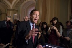 FILE - Sen. Richard Blumenthal, D-Conn., responds to questions from reporters on May 6, 2019.