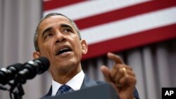 Presiden Amerika Serikat Barack Obama berbicara di American University, Washington (5/8). (AP/Susan Walsh)