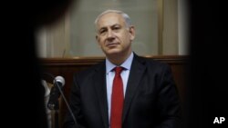 Israel's Prime Minister Benjamin Netanyahu attends the weekly Cabinet meeting in Jerusalem, June 10, 2012.