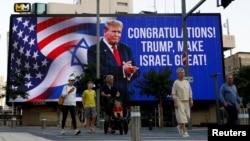 Ucapan Selamat atas kemenangan dalam Pemilu Amerika 2024 kepada calon presiden dari Partai Republik dan mantan Presiden Amerika Donald Trump di Tel Aviv, Israel, 6 November 2024. (Thomas Peter/REUTERS)