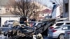 First responders work the scene after a plane crashed in the parking lot of a retirement community in Manheim Township, Pa., March 9, 2025. 