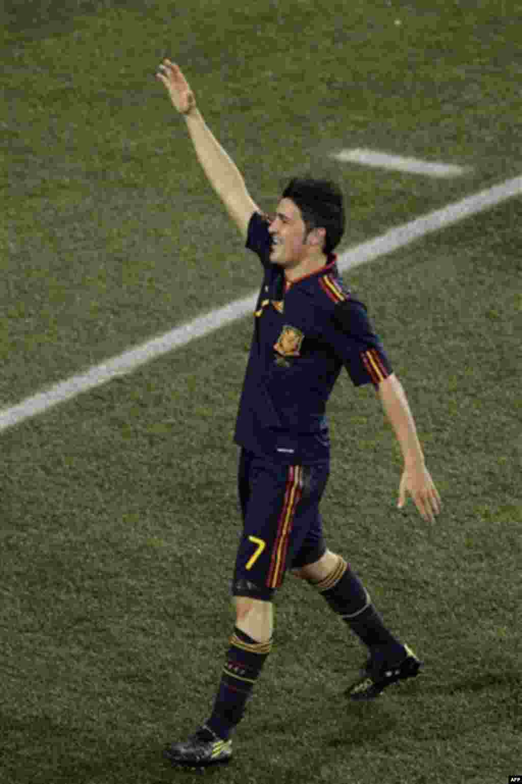 Spain's David Villa celebrates after scoring a goal during the World Cup quarterfinal soccer match between Paraguay and Spain at Ellis Park Stadium in Johannesburg, South Africa, Saturday, July 3, 2010. Spain won 1-0. (AP Photo/Themba Hadebe)
