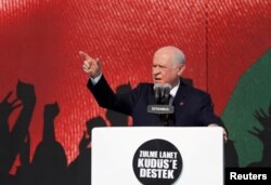 FILE - Nationalist Movement Party (MHP) leader Devlet Bahceli delivers a speech in Istanbul, Turkey, May 18, 2018.