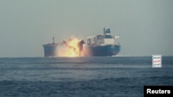 (FILE) The oil tanker Cordelia Moon bursts into flames after being hit by a missile in the Red Sea, off Yemen's Red Sea Port of Hodeida, in this screengrab from a video released on October 1, 2024.