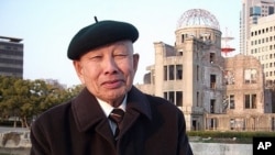 Hiroshima bomb survivor Keijiro Matsushima in the shadow of the A-bomb (atomic bomb) dome