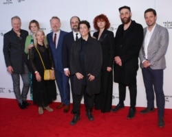 Cast of HBO's Chernobyl miniseries pose for group photo at Tribeca Film Festival in New York.