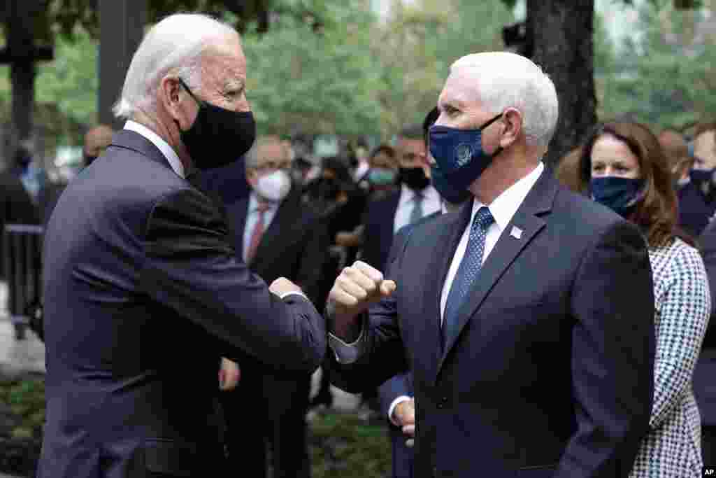 Democratic presidential candidate former Vice President Joe Biden greets Vice President Mike Pence at the 19th-anniversary ceremony in observance of the Sept. 11 terrorist attacks at the National September 11 Memorial &amp; Museum in New York, on Friday, Sept. 11, 2020. (Amr Alfiky/The New York Times via AP, Pool)