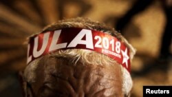 A supporter wears a headband with Lula's name, during the testimony of former Brazilian President Luiz Inacio Lula da Silva in Curitiba, Brazil, May 10, 2017. 