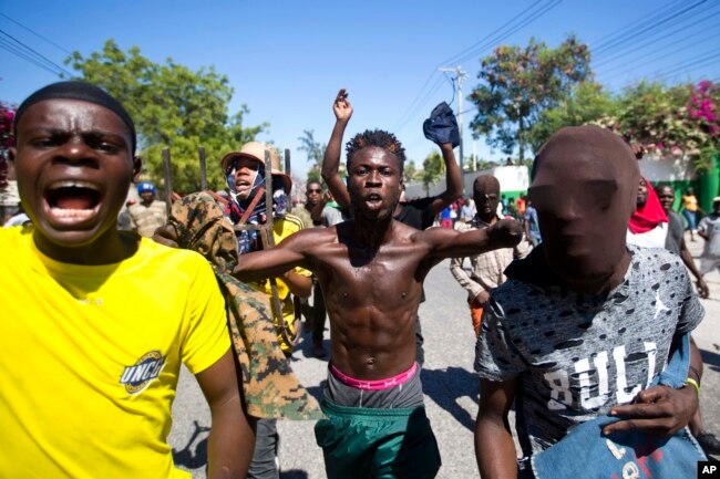 Protesters chant anti-government slogans demanding the resignation of President Jovenel Moise in Port-au-Prince, Haiti, Feb. 11, 2019.