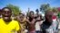 Los manifestantes corean consignas antigubernamentales que exigen la renuncia del presidente Jovenel Moise en Puerto Príncipe.