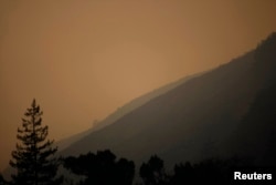 Thick smoke from wildfires hangs over Big Sur, California, Dec. 16, 2013