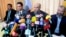 FILE - Younes Makhyoun, second from right, head of the Salafist al-Nour Party, at party headquarters, Cairo, Aug. 28, 2013.