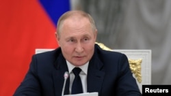 Russian President Vladimir Putin attends meeting with parliamentary leaders in Moscow