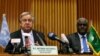 FILE - U.N. Secretary General Antonio Guterres, left, and the African Union Commission Chairperson Moussa Faki Mahamat attend a news conference at the African Union Commission headquarters in Addis Ababa, Ethiopia, July 9, 2018. 