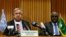 FILE - U.N. Secretary General Antonio Guterres, left, and the African Union Commission Chairperson Moussa Faki Mahamat attend a news conference at the African Union Commission headquarters in Addis Ababa, Ethiopia, July 9, 2018. 