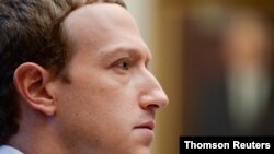 FILE - Facebook Chairman and CEO Zuckerberg testifies at a House Financial Services Committee hearing in Washington.