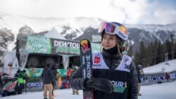 Eileen Gu, of China, looks toward the crowd following the halfpipe finals, Dec. 17, 2021, during the Dew Tour freestyle skiing event at Copper Mountain, Colo.