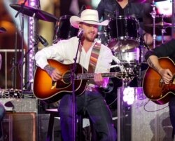 FILE - Country singer Cody Johnson performs during the CMT Crossroads "Brooks &amp; Dunn and Friends" live taping in Nashville, Tennessee, June 4, 2019.