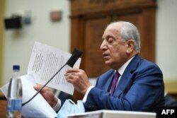 FILE - Zalmay Khalilzad, U.S. special representative on Afghanistan reconciliation, speaks during a House Foreign Affairs Committee hearing on Capitol Hill, in Washington, May 18, 2021.