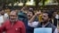 FILE - Indian journalists shout slogans for the freedom of press near Supreme Court in New Delhi, India Tuesday, Feb. 16, 2016.