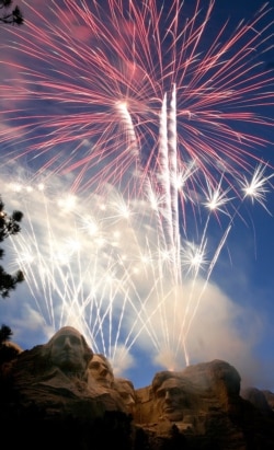 FILE - Fireworks light up the night sky over Mount Rushmore National Memorial in South Dakota, July 3, 2007, during the 10th annual Heartland of America Independence Day Celebration at the Shrine of Democracy.