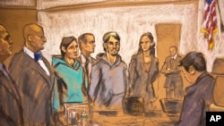 In this courtroom sketch, defendants Akhror Saidakhmetov, third from left, and Abdurasul Hasanovich Juraboev, fourth from right, stand in Federal Court at their arraignment Feb. 25, 2015, in Brooklyn, New York.