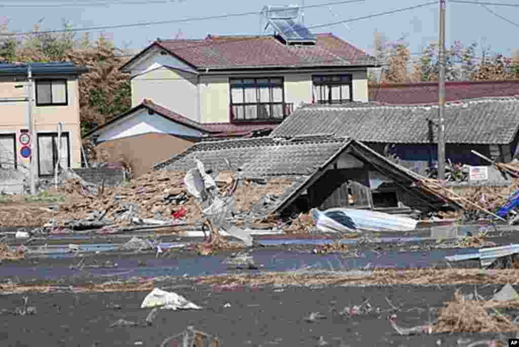 A home buried by the tsunami a month ago, Namie, Fukushima Pref., Japan, March 12 2011 (VOA - S. L. Herman)