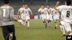 지난 2006년 인도 콜카타에서 열린 아시아 청소년 축구대회에 출전한 북한 선수들. 결승전에서 일본을 누르고 우승을 차지했다. (자료사진)