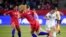 Mexico defender Jimena Lopez (5) passes the ball while U.S. midfielder Samantha Mewis (3) defends during the second half of the CONCACAF Women's Olympic Qualifying soccer tournament, Feb. 7, 2020, at Dignity Health Sports Park, Los Angeles, Calif.