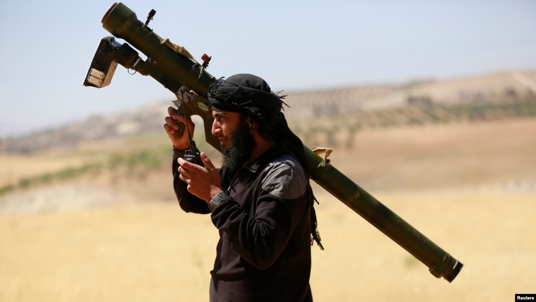 FILE - An Islamist Syrian rebel group Jabhat al-Nusra fighter.
