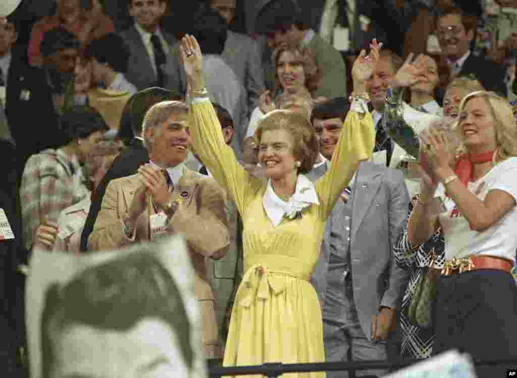 FILE - Betty Ford is shown surrounded by family, greeting the crowds at the Republican National Convention in Kemper Arena, Kansas City, Mo., Aug. 17, 1976. Incumbent President Gerald Ford won the nomination.