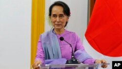 Myanmar's State Counselor and Foreign Minister Aung San Suu Kyi speaks to the media during a joint press conference with Japanese Foreign Minister Taro Kono at the Ministry of Foreign Affairs in Naypyitaw, Jan. 12, 2018.