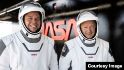 NASA astronauts Robert Behnken and Douglas Hurley take part in a test rehearsal for their space flight at Florida's Kennedy Space Center. (SpaceX/Flickr)