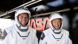 NASA astronauts Robert Behnken and Douglas Hurley take part in a test rehearsal for their space flight at Florida's Kennedy Space Center. (SpaceX/Flickr)