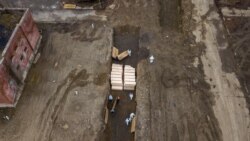 Drone pictures show bodies being buried on New York's Hart Island where the department of corrections is dealing with more burials overall, amid the coronavirus disease (COVID-19) outbreak in New York City, U.S., April 9, 2020.