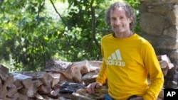 In this photo taken Tuesday Aug. 30, 2016, Theo Padnos poses at the family's house in remote Reading, Vt. In 2012, journalist, Padnos slipped into Syria to cover its unfolding civil war and was promptly kidnapped by members of an al-Qaida branch. 