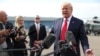 U.S. President Donald Trump speaks to reporters as he boards Air Force One for travel to New Hampshire from Morristown Municipal Airport in Morristown, New Jersey, Aug. 15, 2019. 